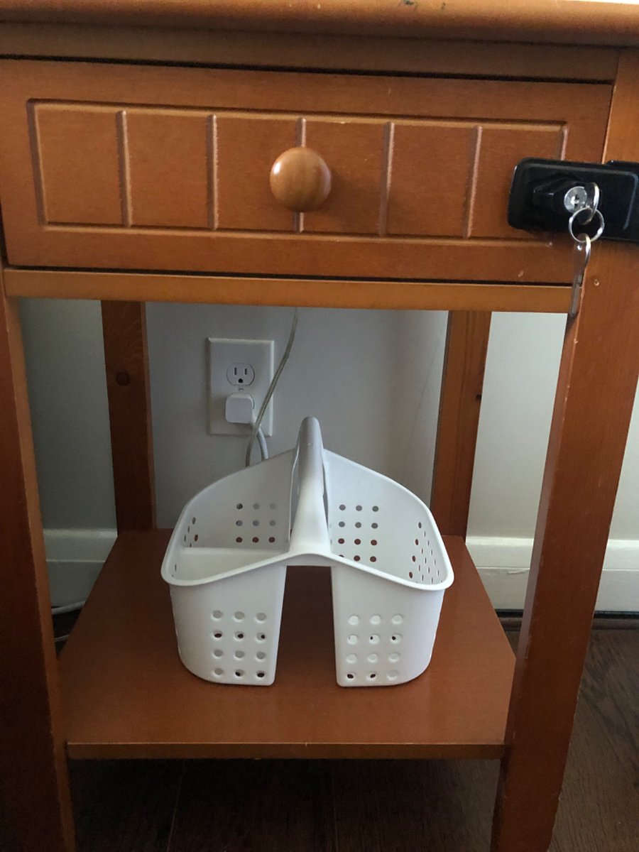 In this room as well, beneath the bedside table of each bed is a basket to use for your bathroom toiletries.