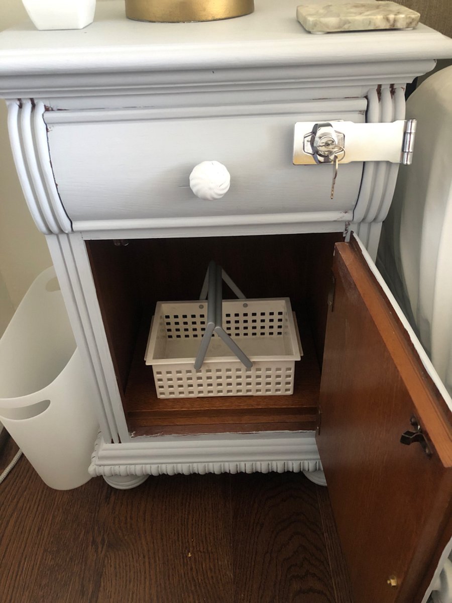 Beneath the bedside table of each bed is a basket to use for your bathroom toiletries.