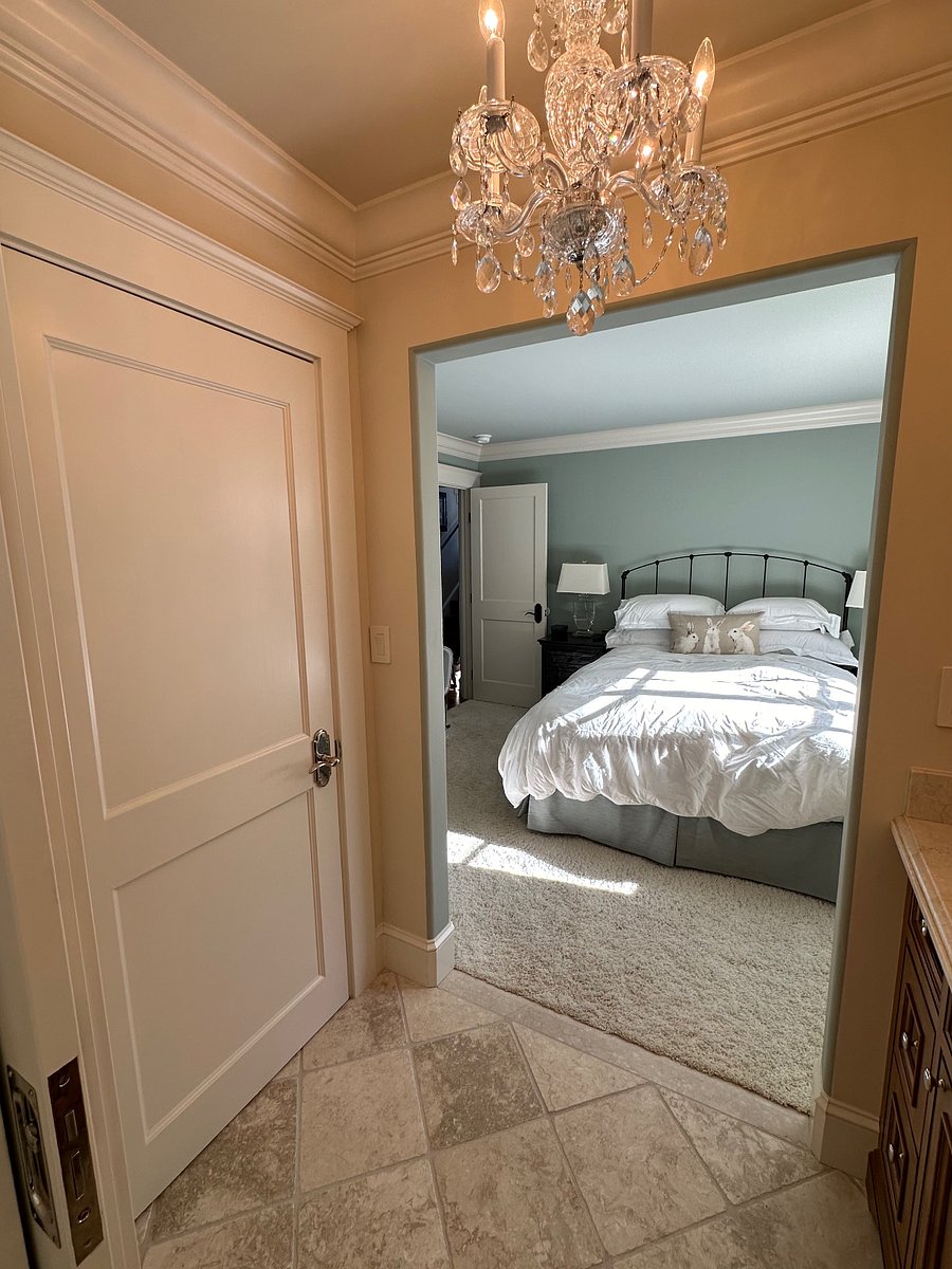 Comfortable bed, premium mattress, sheets, and duvet.