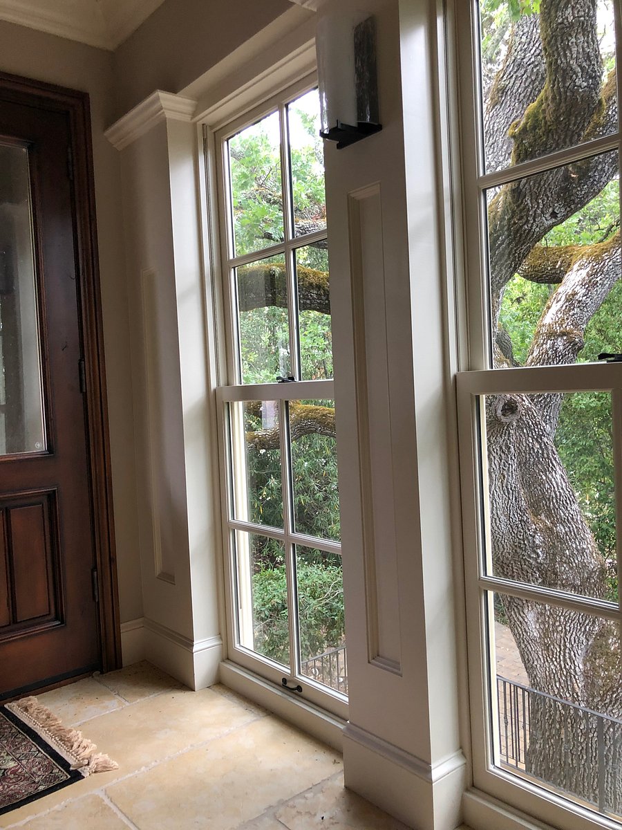 Two of multiple sets of windows in entranceway.