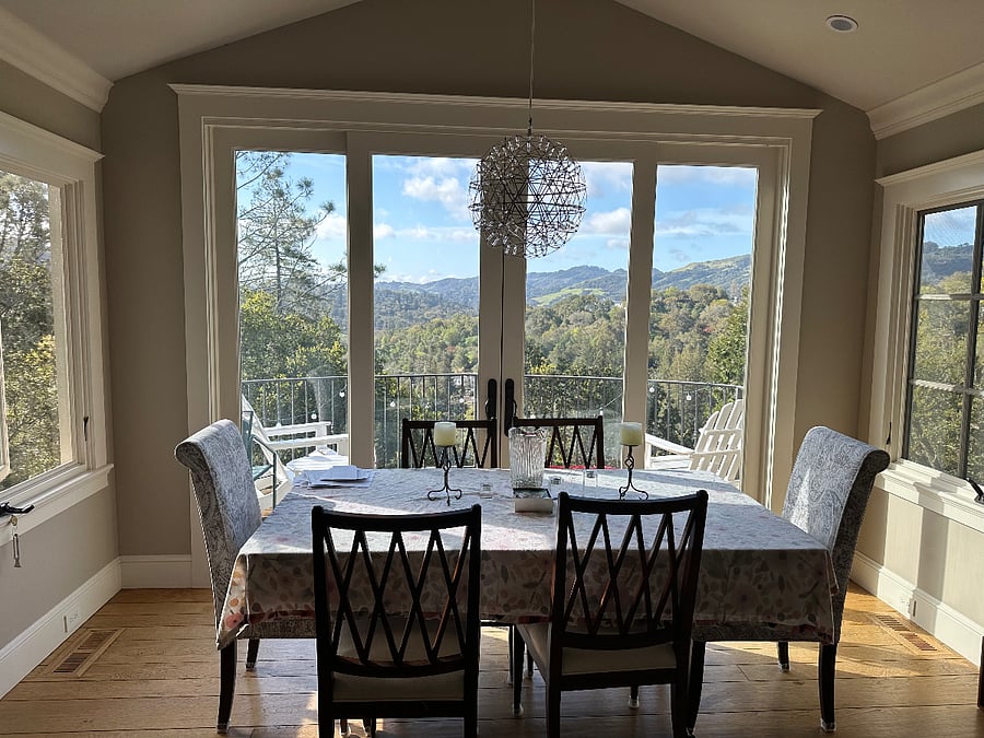 Dining area off living area with fabulous views and light
