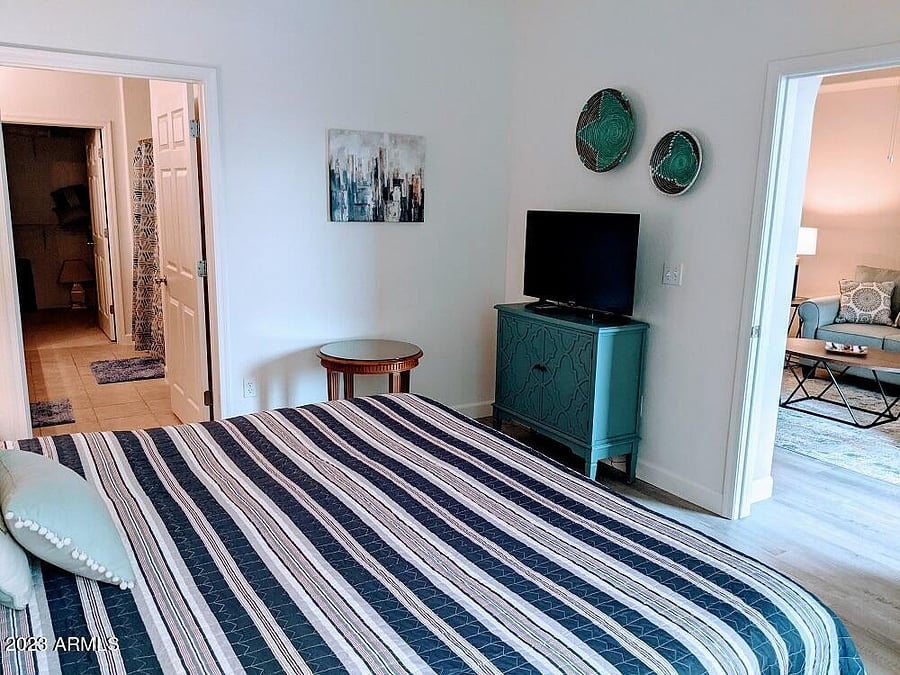 Primary bedroom with tv