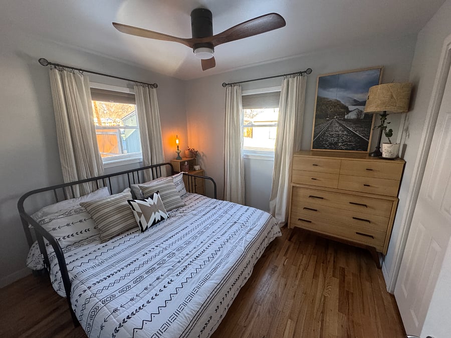 Guest room with bed as king, no desk. This room also has blinds and blackout curtains.