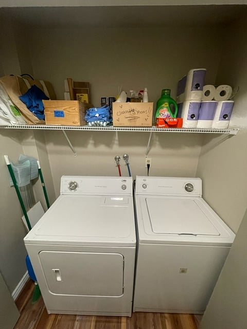 In-house washer and dryer with cleaners, tool kit, laundry detergent, and spare toilet paper