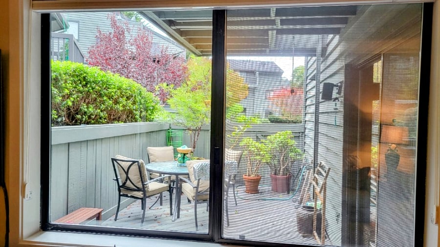 Sunny patio is accessed from the dining room