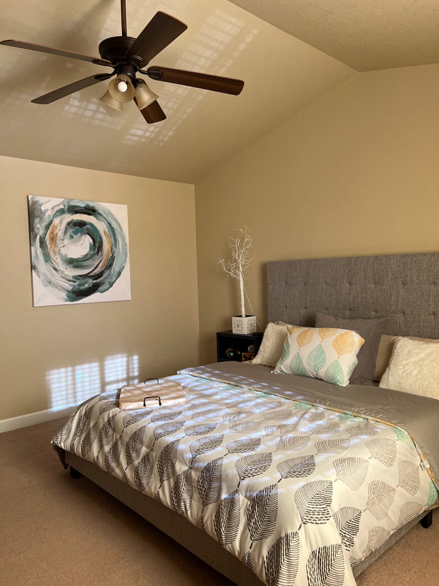 Master bedroom with king size bed.