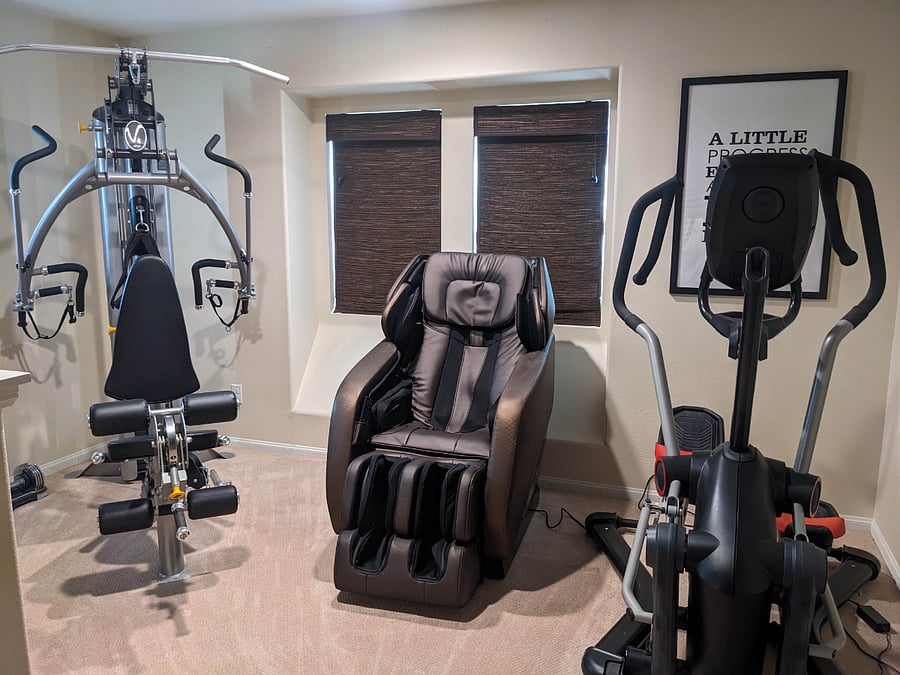 Loft gym with massage chair.