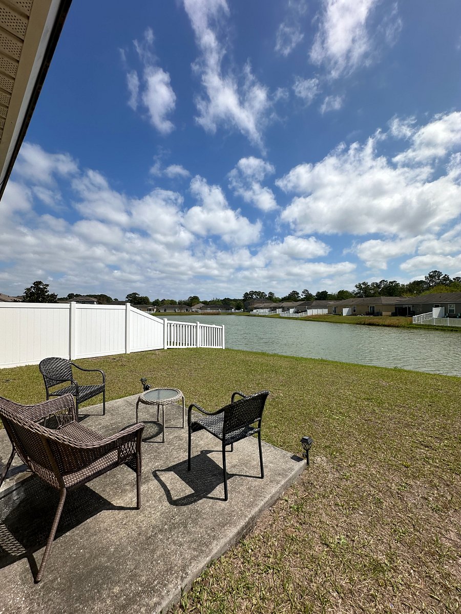 Outside Porch Area with Lake Views & Backyard