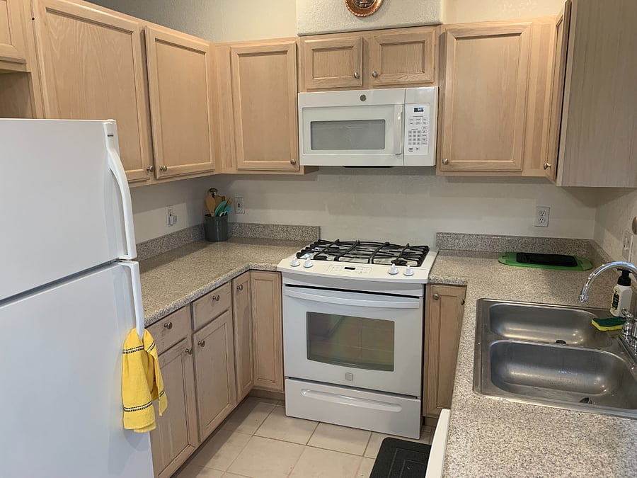 Full kitchen with all utensils and cooking implements