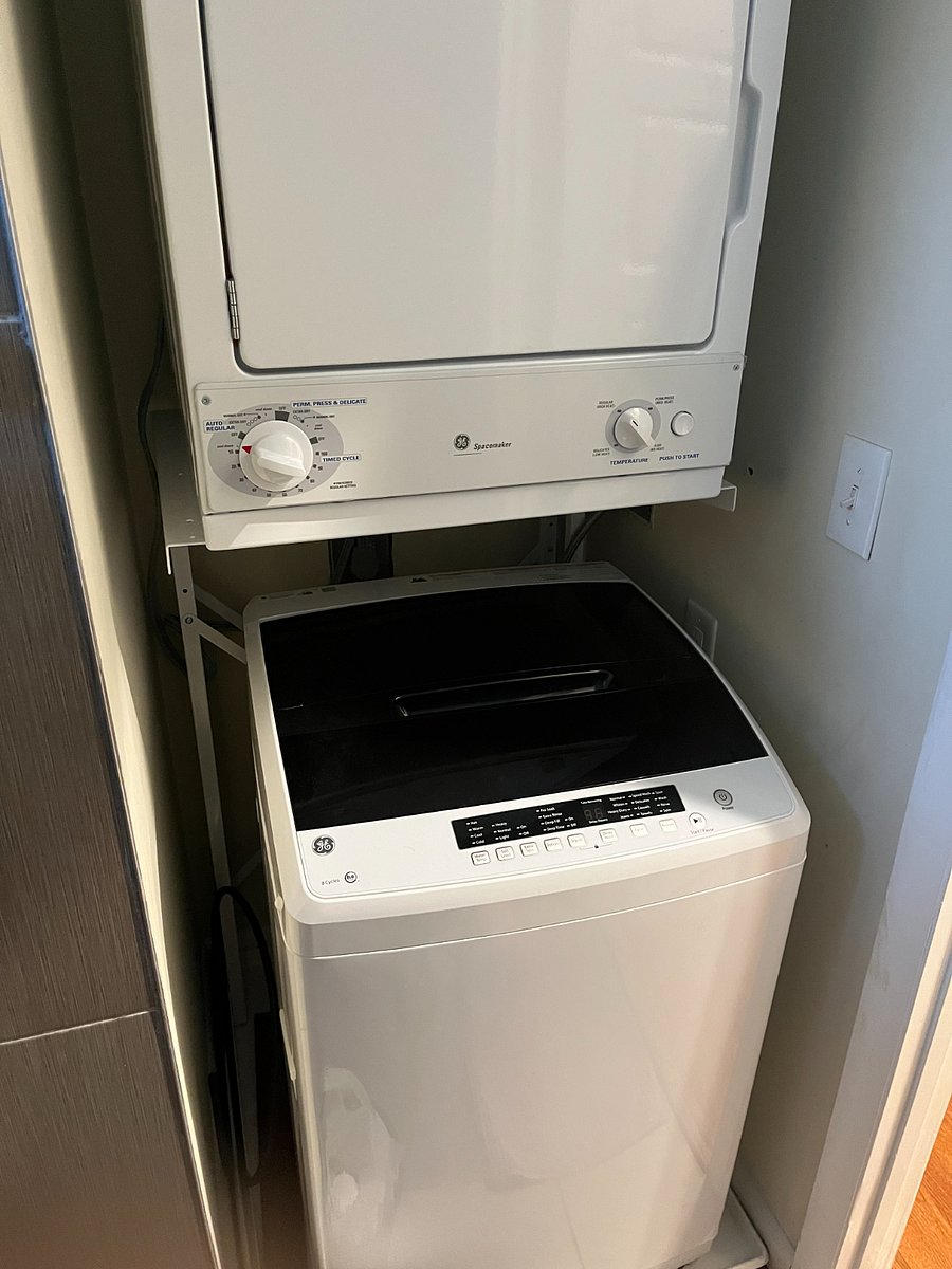 Bathroom complete with washer and dryer.