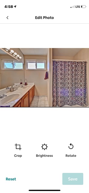 Guest Bathroom.  Shower/tub + Two sinks.