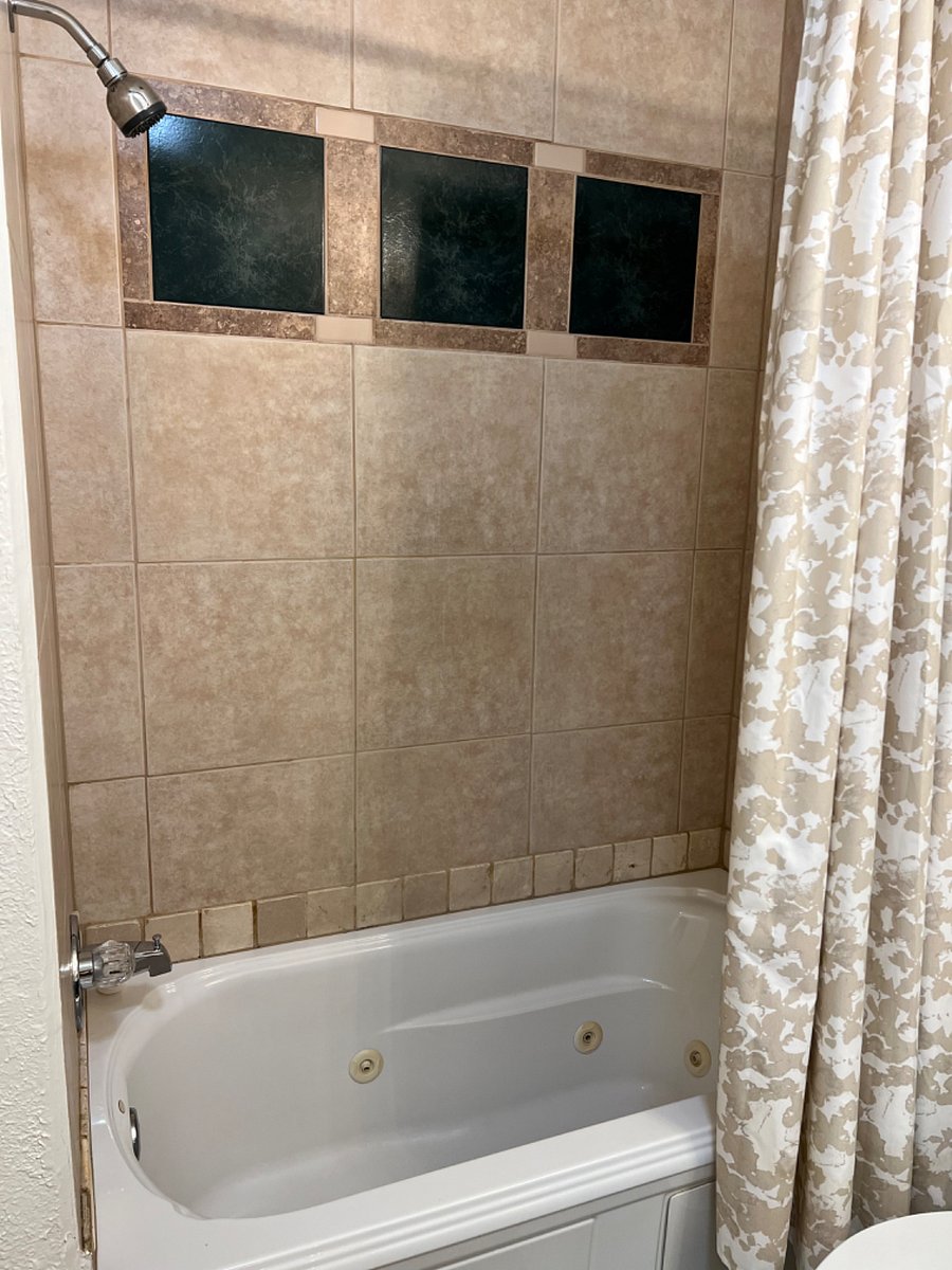 Full bathroom with bath tub