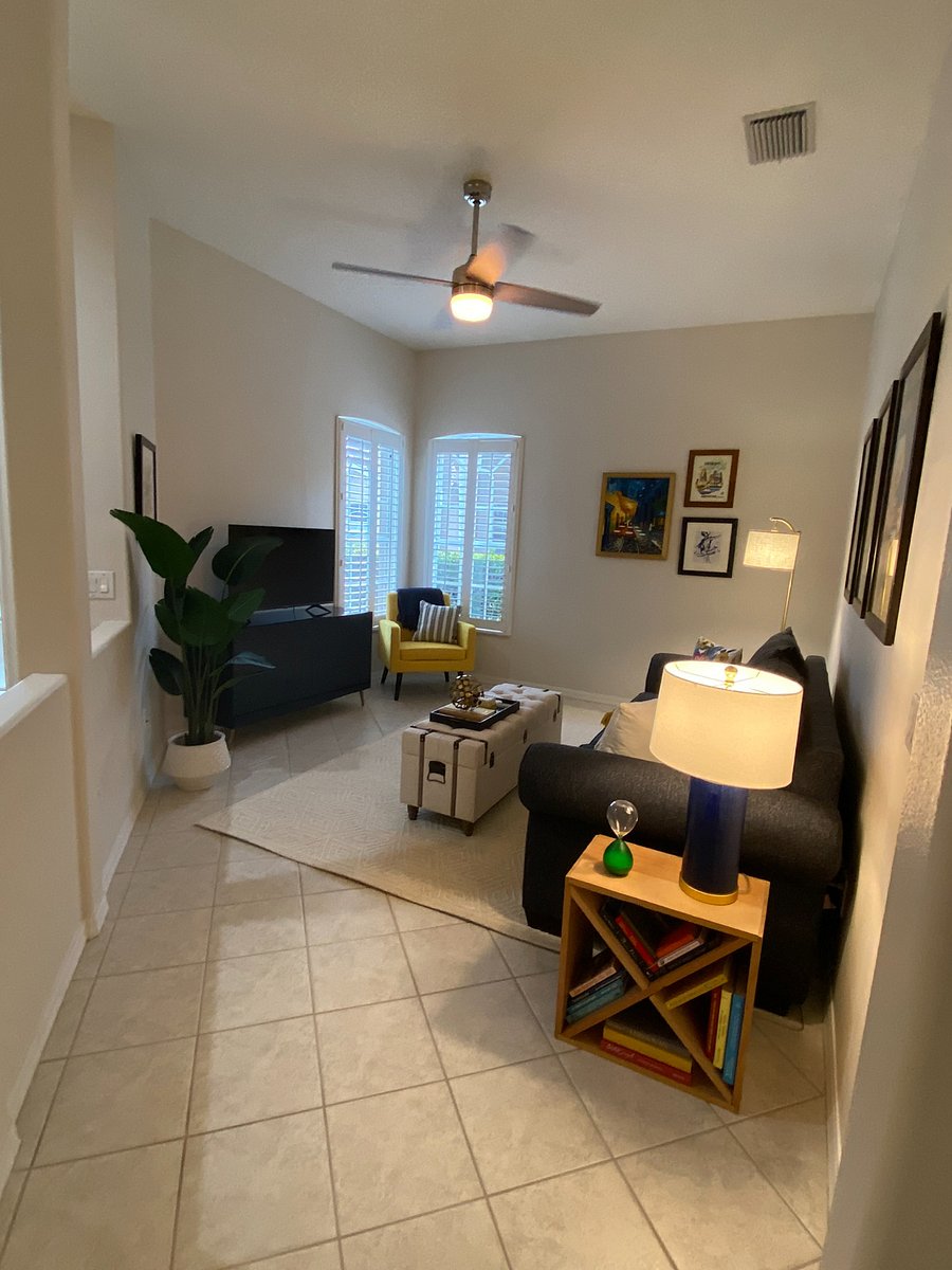 Den with Smart TV, Loveseat, Chair and Nice Decor