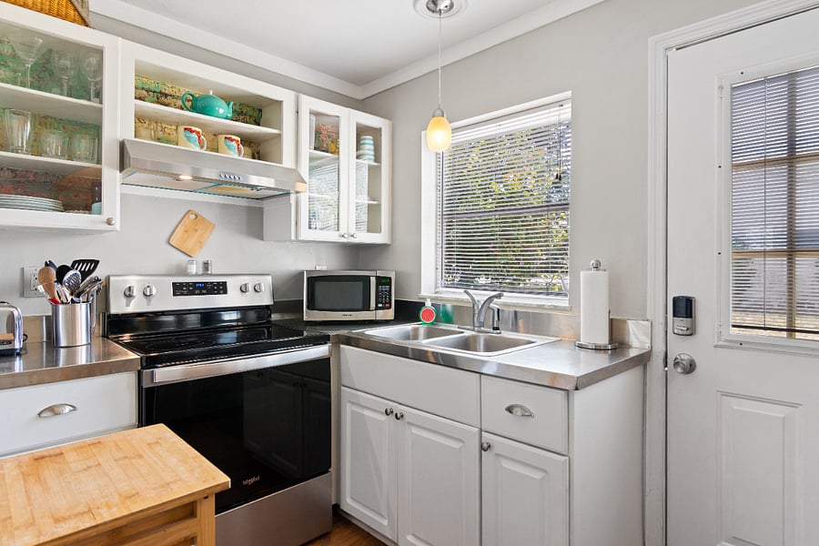 Complete kitchen with microwave, coffee maker, full size refrigerator