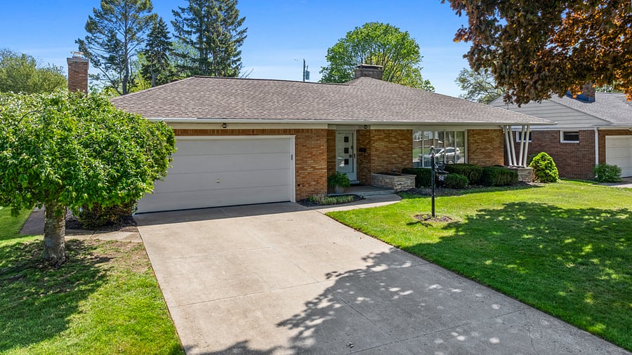 Front Entrance showing 2 car garage and driveway
