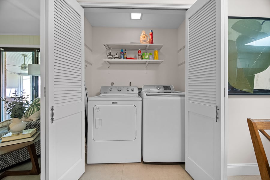 Laundry Area next to kitchen dining area,