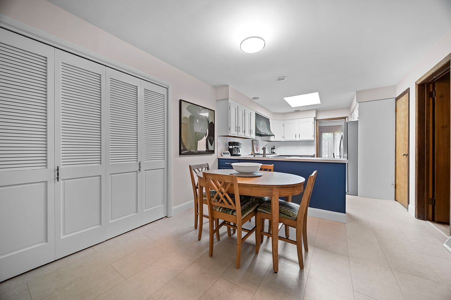 Kitchen Dining Area - table has an extra leaf with 2 additional chairs - not shown
Behind the bifold doors is the Laundry Area