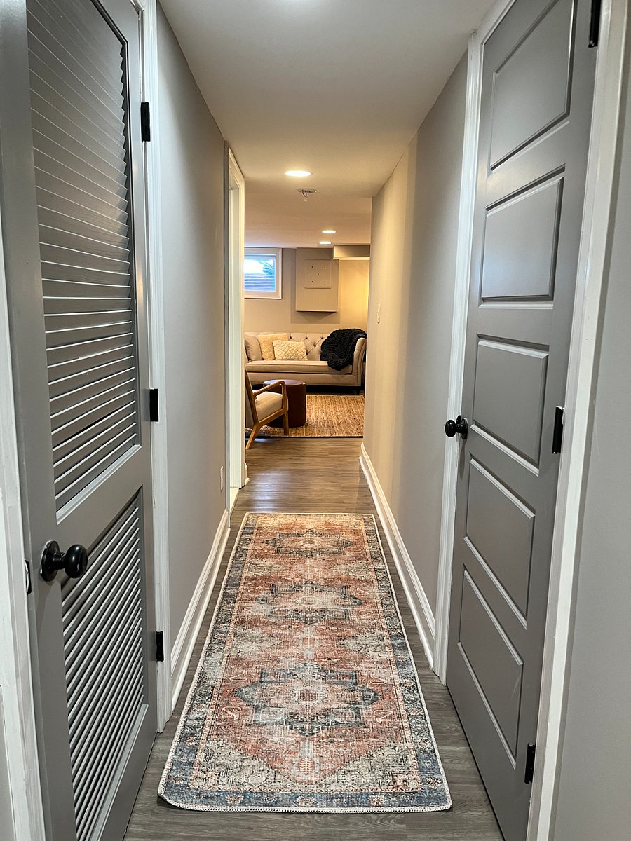 Hallway from bedroom to bathroom and kitchen/living
