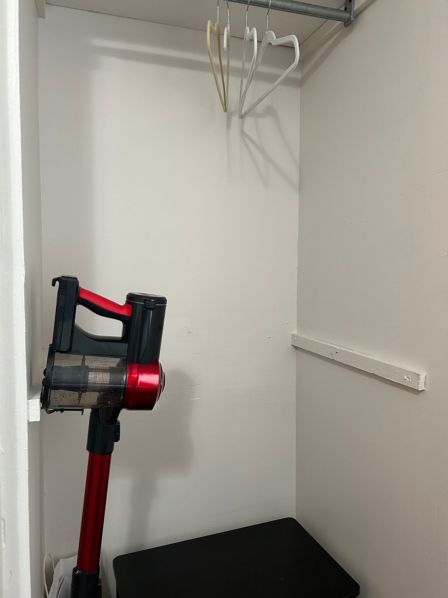Handy cordless vacuum in 2nd bedroom and plenty of storage.