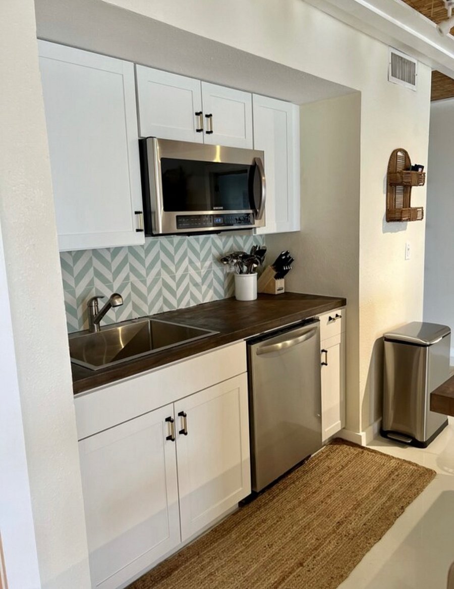 Kitchen with dishwasher and microwave 