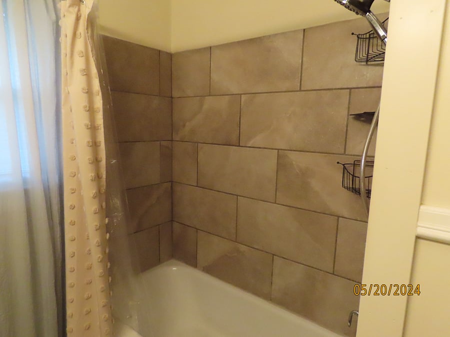 Tiled shower and great water pressure