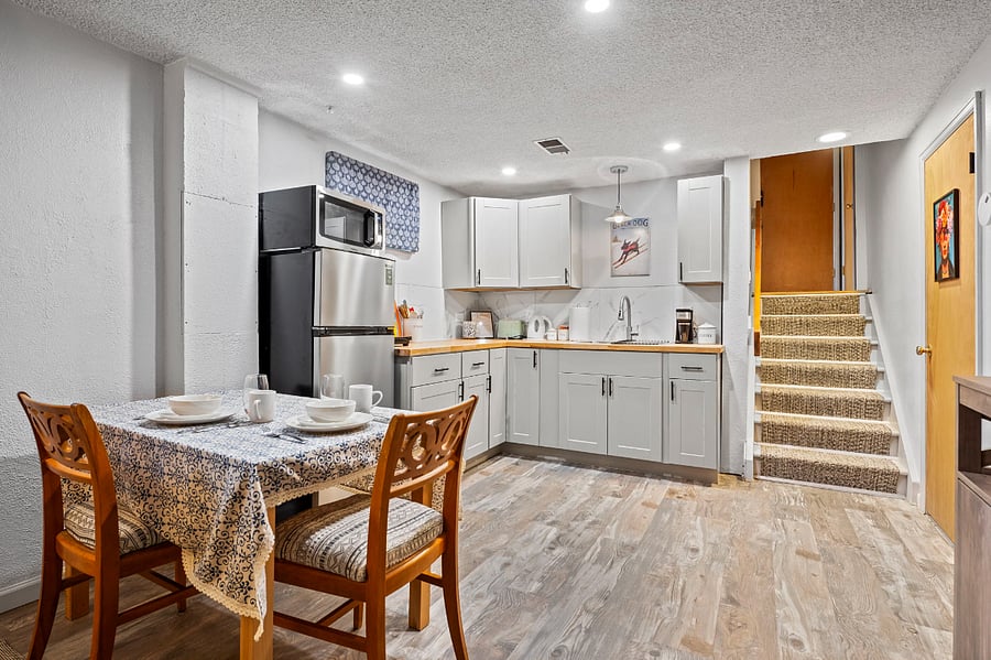 The basement of this home is actually a mother-in-law suite. Great for visiting family, working remotely, or that family member who wants more independence. The kitchen has all you'll need to whip up a great meal. The microwave is also an air fryer which is great for warming up take--out. 
