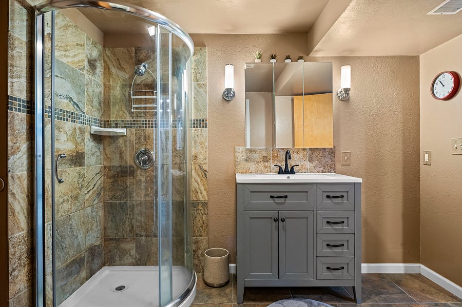 The mother in law bathroom has been remodeled too. It's spacious and comfortable with plenty of storage. The laundry room is in the next room - very convenient!
