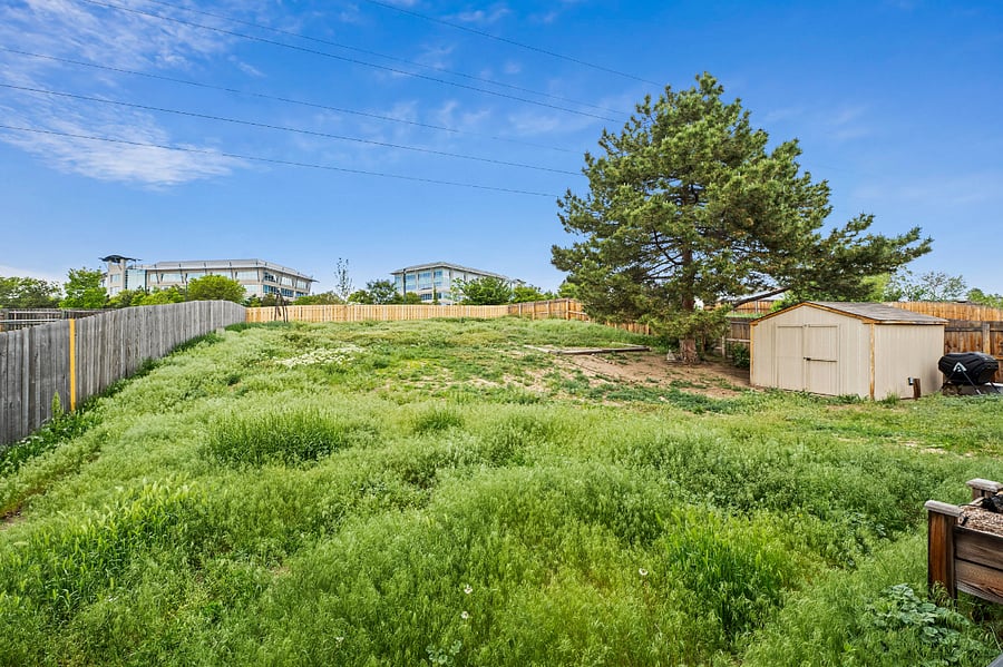 Need some quiet time in nature? Just step out back. Play ball with your dog, sit in the meditation area and enjoy the wind chimes, or enjoy some nature and the sunrise with a hot cup of coffee on a cool Colorado morning. Shade trees, native plants, and a fully fenced quarter acre for you (and your pup) to enjoy. 