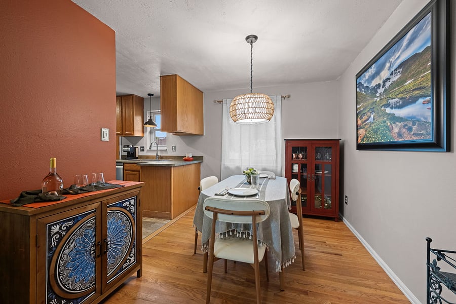 This table goes from square to oval depending on what you need. It's a nice place to host a small dinner, enjoy a meal with family or to work from home. Fantastic for zoom meetings, too!
