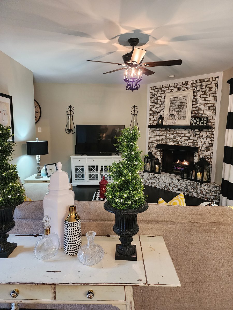 Comfortable Family Room with extra seating and stored lush throw pillows and throws for cozying in for the evening