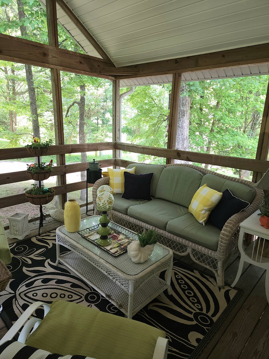 Comfortable couch for napping on the screened in porch