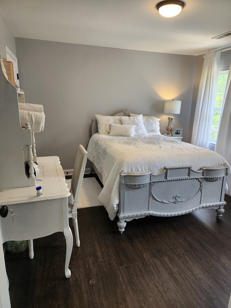 3rd bedroom with Queen Sized bed and vanity/dressing table; there is also a reading nook in this room.  Light and Bright!  Great sized closet for storage; extra blankets and pillows