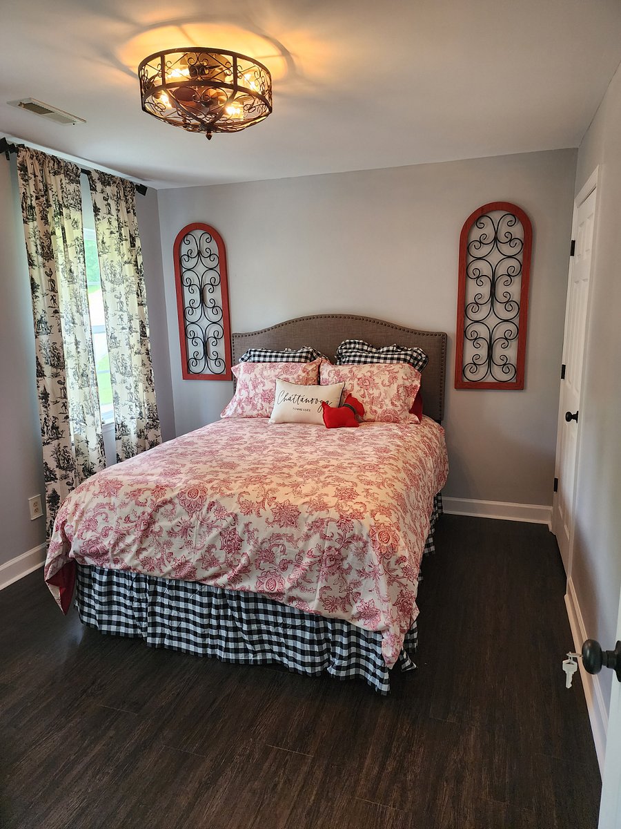 2nd bedroom with queen size bed and large closet with extra blankets and pillows