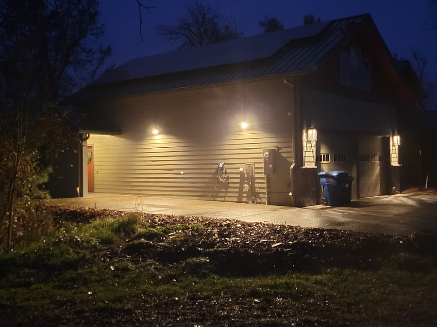 Parking area with EV2 Charger and Motion-detector lighting.