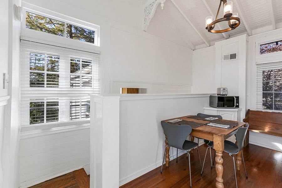 Kitchen dining table and ornate brackets we discovered when renovating the house