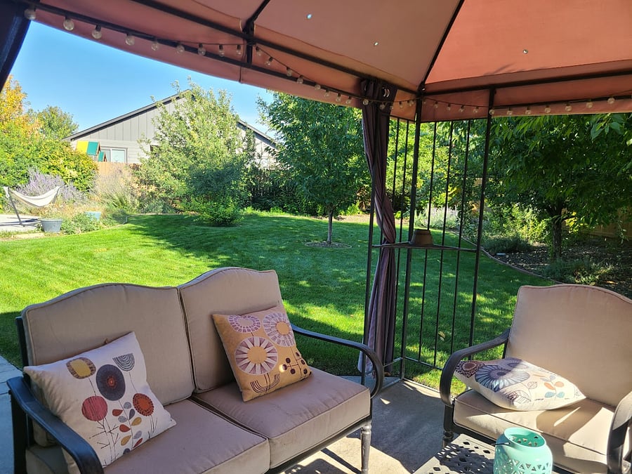 Covered patio area in the back yard.