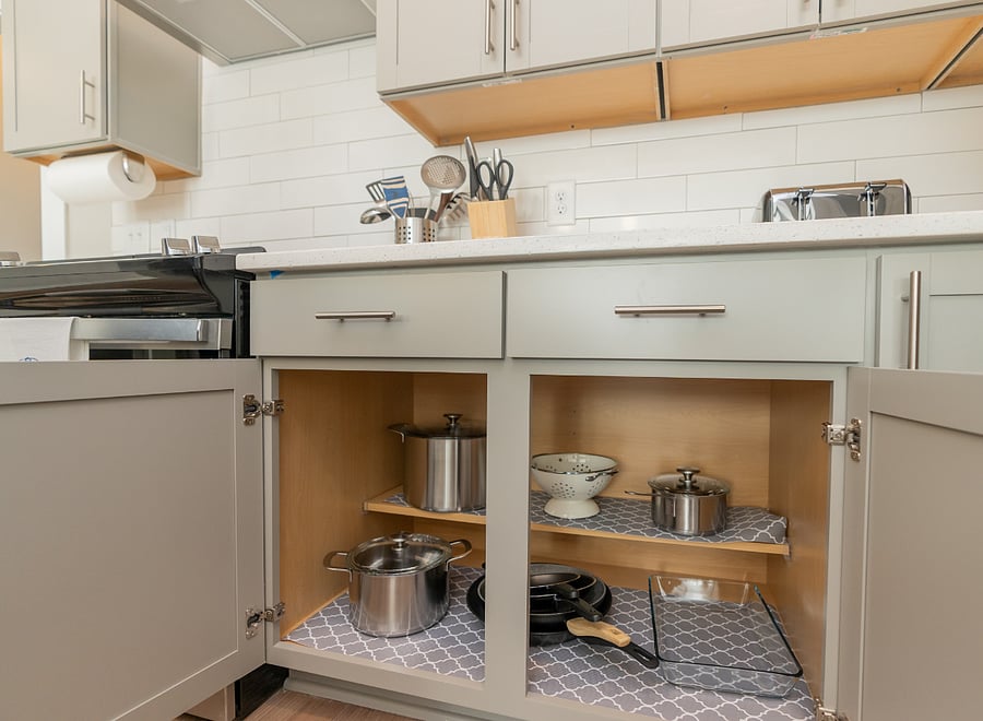 Pots and pans, dishes and silverware included