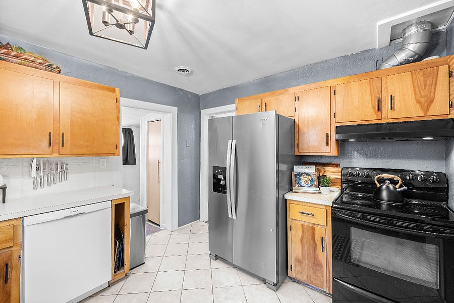 Kitchen Facing Laundry Room and Bedroom #1