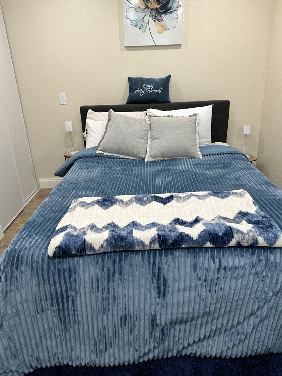 Queen Bed- Sometimes we use the blue and sometimes the beige comforter.