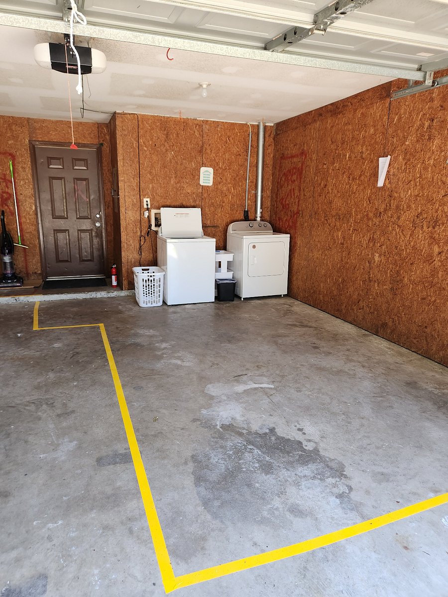 Laundry & storage area in garage. No vehicle parking. Owner uses garage for storage.