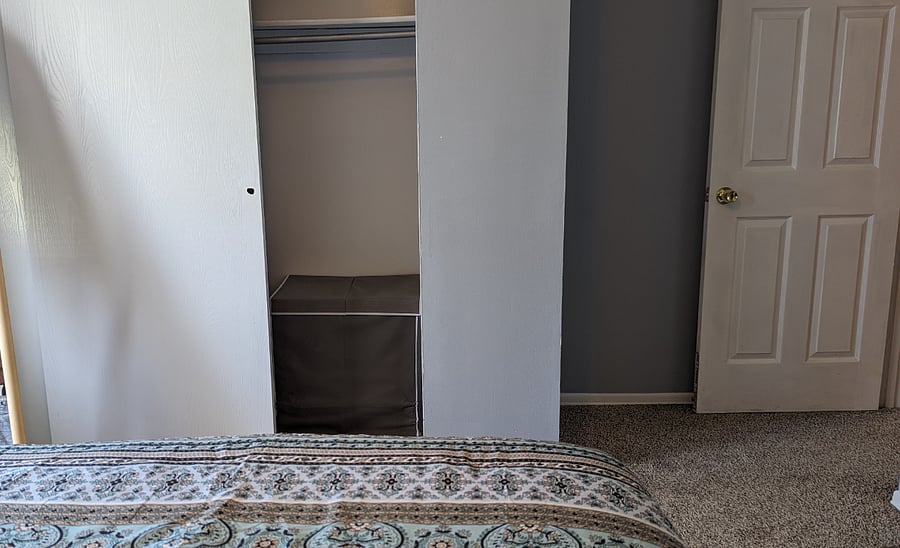 Closet with a Nice Size Hamper