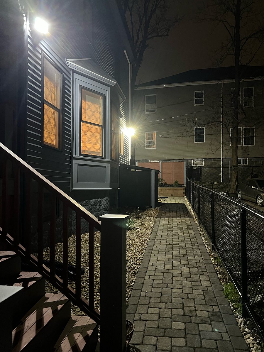Well lit pathway at night