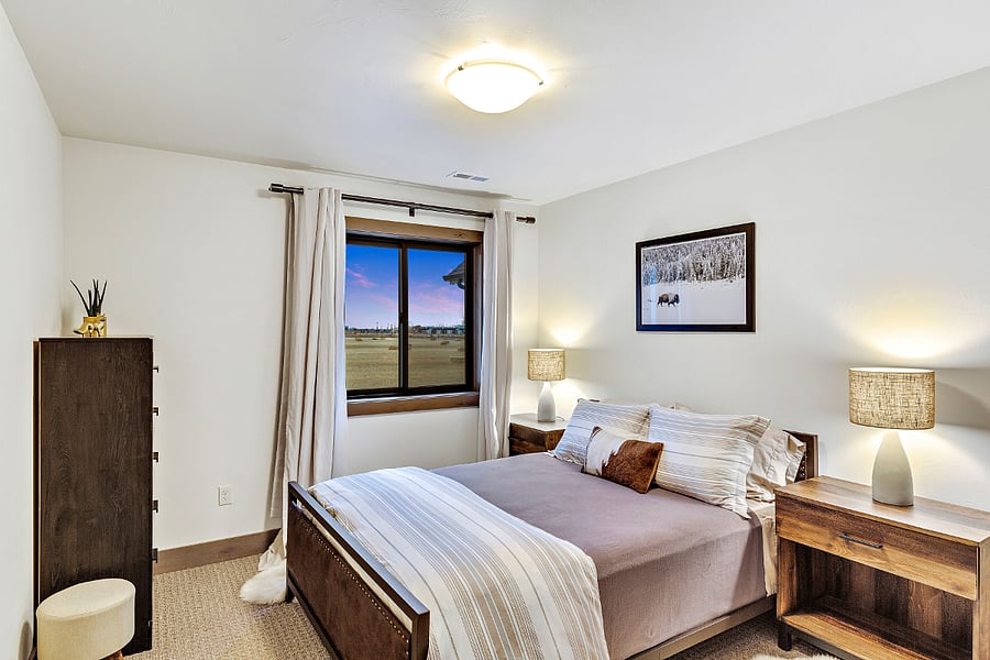 Upstairs bedroom with queen bed.