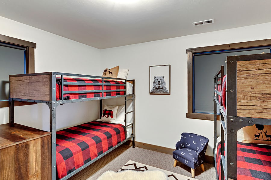 Upstairs bedroom with two bunk beds.