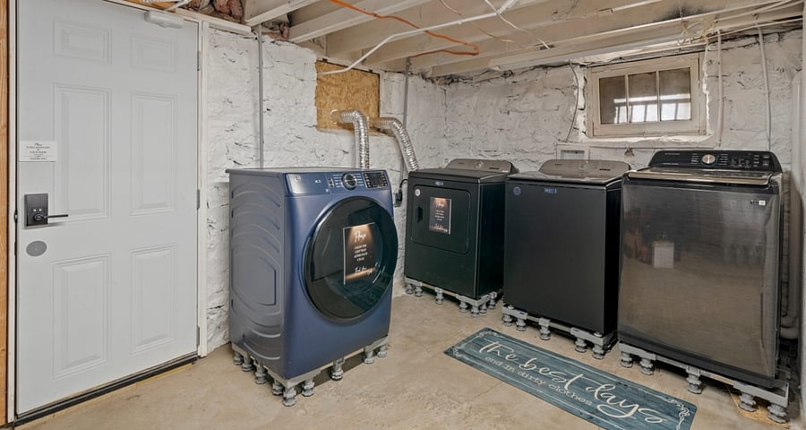 Laundry room. 2 washers 2 dryers