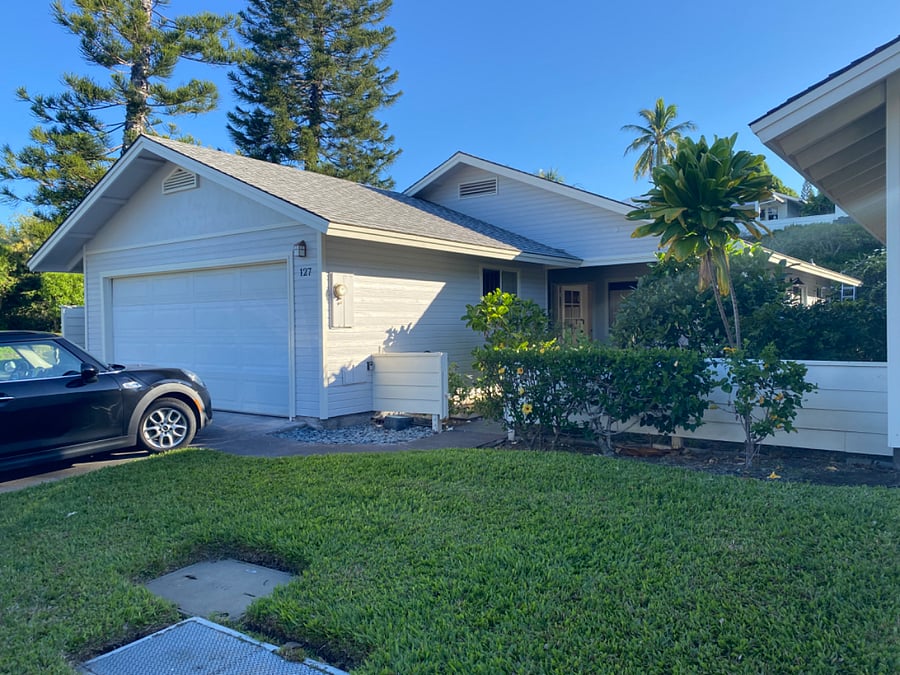 Garage and driveway. Washer/dryer are in garage. Parking for two cars on driveway.