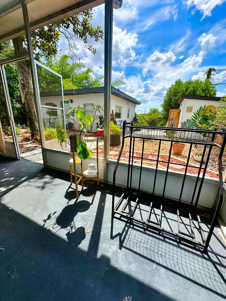 Beautiful, spacious screened in back porch
