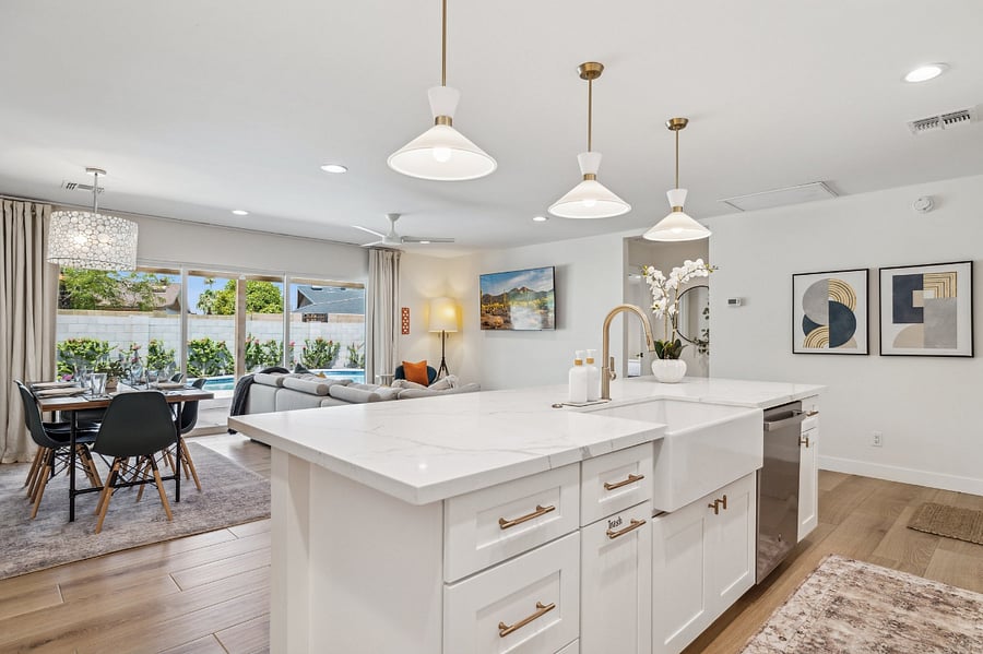 Kitchen, Dining Area and Back Living Room With a 12-Foot, Sliding Glass Door