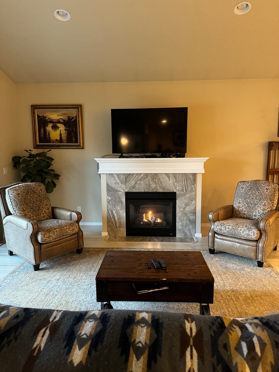 Two recliners. Gas Fireplace.