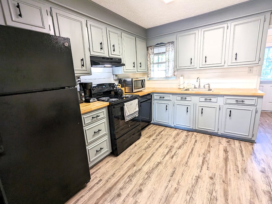Your well-equipped kitchen has brand new appliances and beautiful butcher block counter tops.